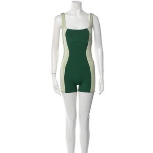 Reformation workout romper in two shades of green! Sliming illusion with pattern